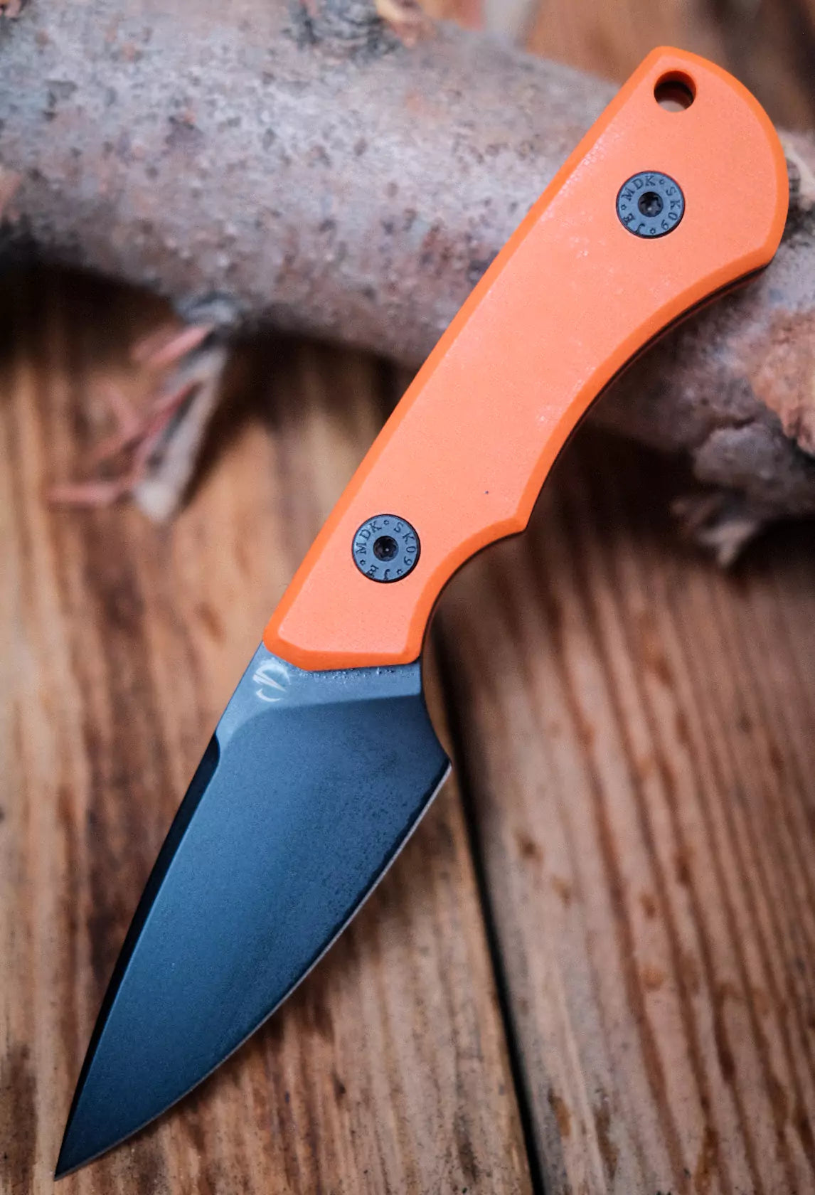 SK09 G10 orange – 14C28 mit Kydex-Scheide